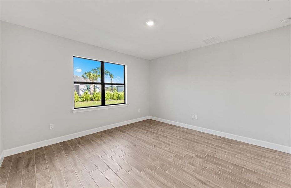 Spacious, unfurnished interior of a new home in Arbor Oaks, North Port (Image 24). Spacious, unfurnished interior of a new home in Arbor Oaks, North Port (Image 24).