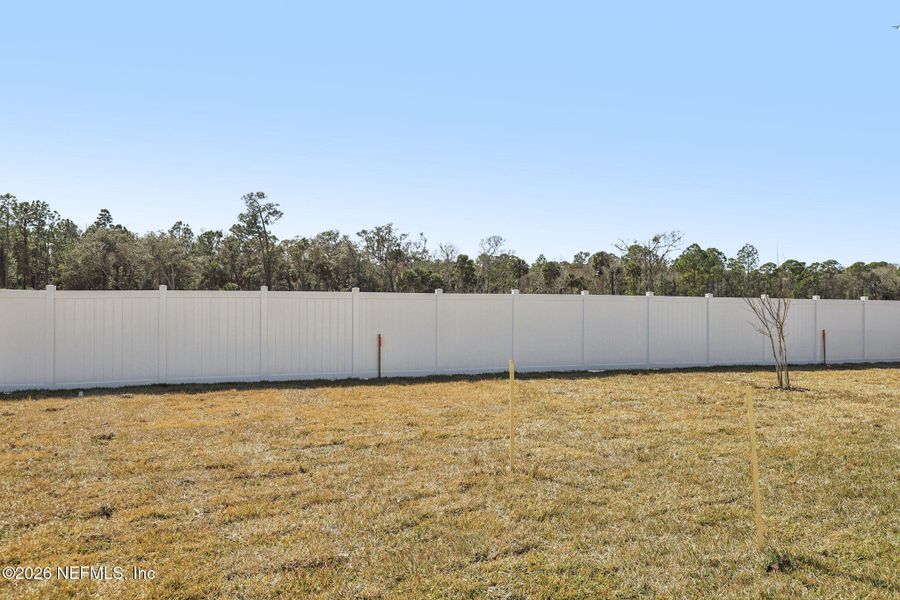 Exterior details and patio area of a home in Colbert Landings, Palm Coast (Image 26).