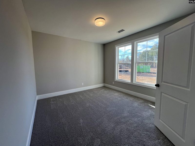 Spacious, unfurnished interior of a new home in The Cove, Sumter (Image 20).