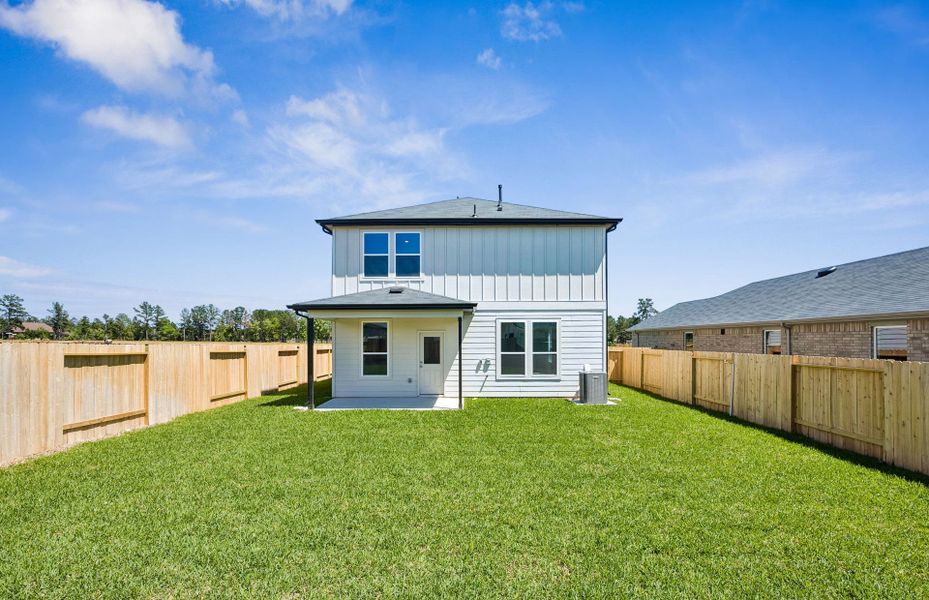 Exterior details and patio area of a home in Montgomery Bend, Montgomery (Image 3).