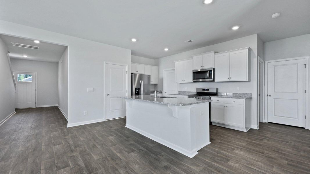 Furnished interior view inside a new home in Pine Hills at Cane Bay, Summerville (Image 7). Furnished interior view inside a new home in Pine Hills at Cane Bay, Summerville (Image 7).