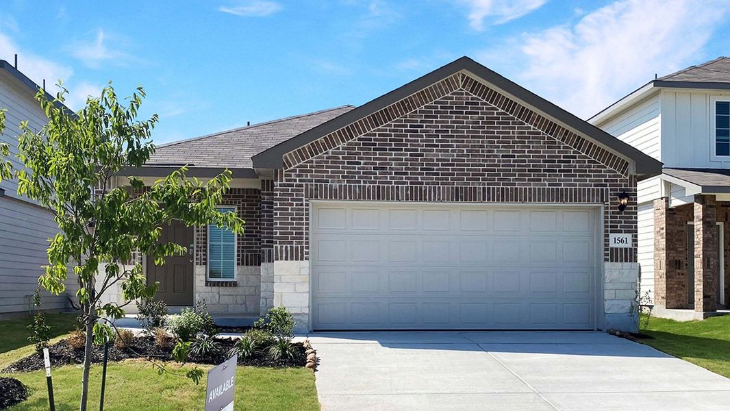 Front exterior of a new home in Winding Creek, New Braunfels, TX, highlighting curb appeal (Image 1). Front exterior of a new home in Winding Creek, New Braunfels, TX, highlighting curb appeal (Image 1).