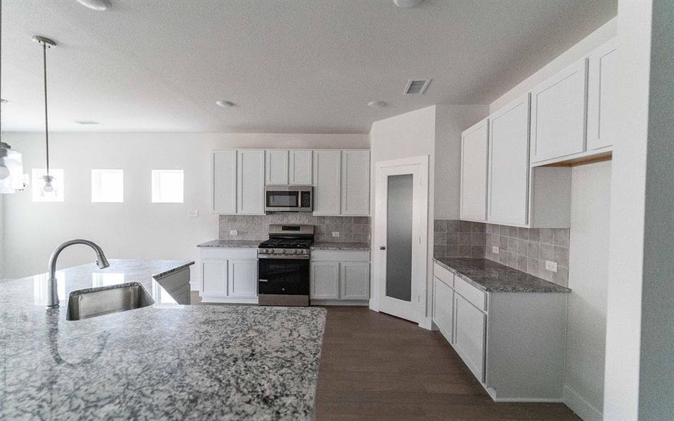 Furnished interior view inside a new home in Pebblebrook, Sherman (Image 6).