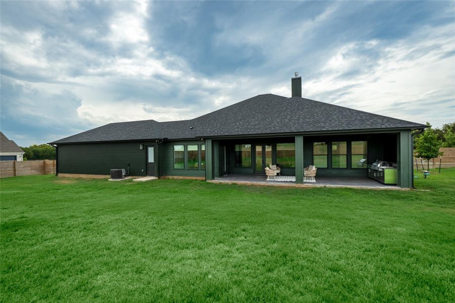 Exterior details and patio area of a home in , Smithville (Image 28).