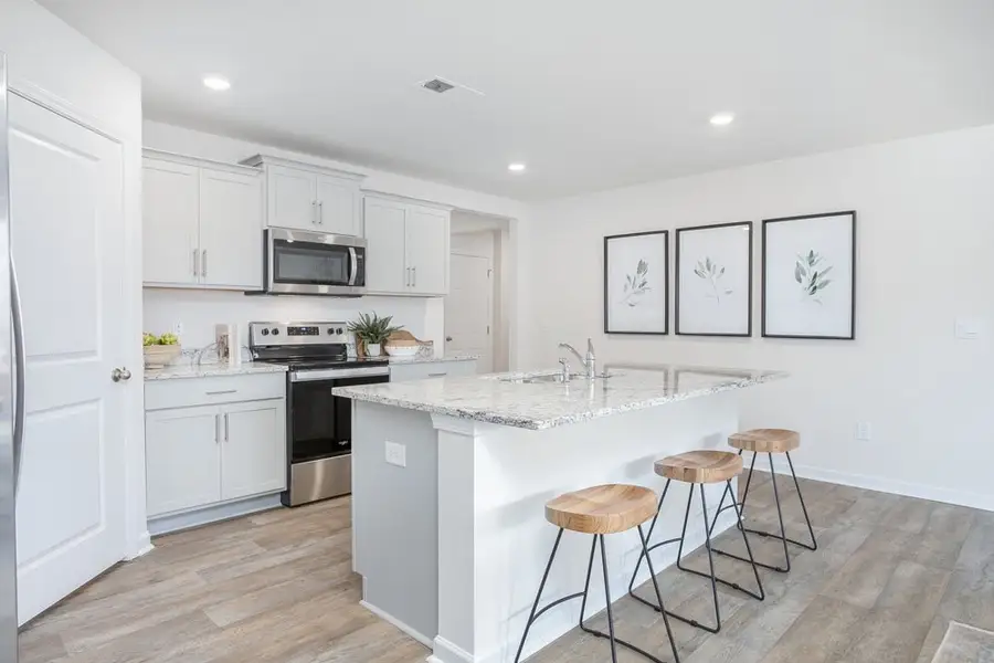 Representative furnished interior of a home built from the CALI by D.R. Horton in Edinborough, Gibsonville (Image 10). Representative furnished interior of a home built from the CALI by D.R. Horton in Edinborough, Gibsonville (Image 10).