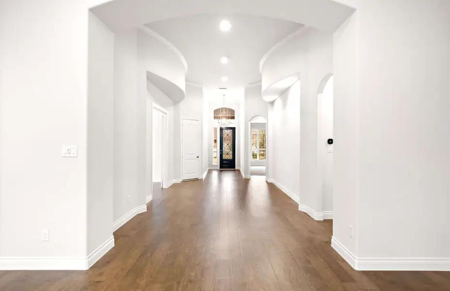 Representative unfurnished interior of a home built from the 3068 by Ravenna Homes in The Woodlands Hills 65′, Willis (Image 21).