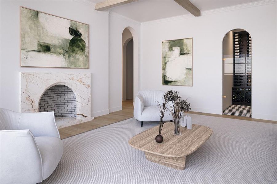 Living room with beamed ceiling, ornamental molding, arched walkways, and wood finished floors