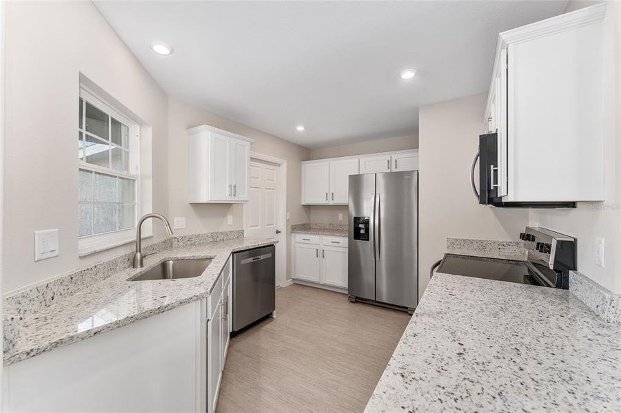 Furnished interior view inside a new home in , Floral City (Image 15).