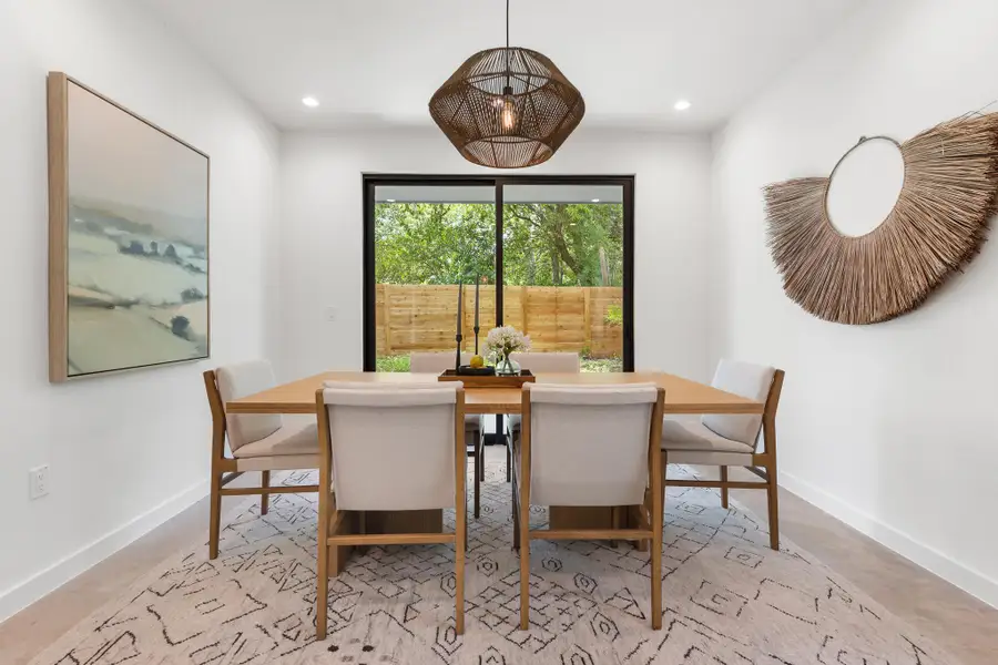 The dining area provides a comfortable space for casual meals or evening gatherings. The dining area provides a comfortable space for casual meals or evening gatherings.