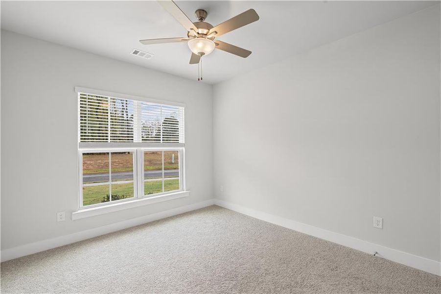 Spacious, unfurnished interior of a new home in Rose Creek, Cumming (Image 37).