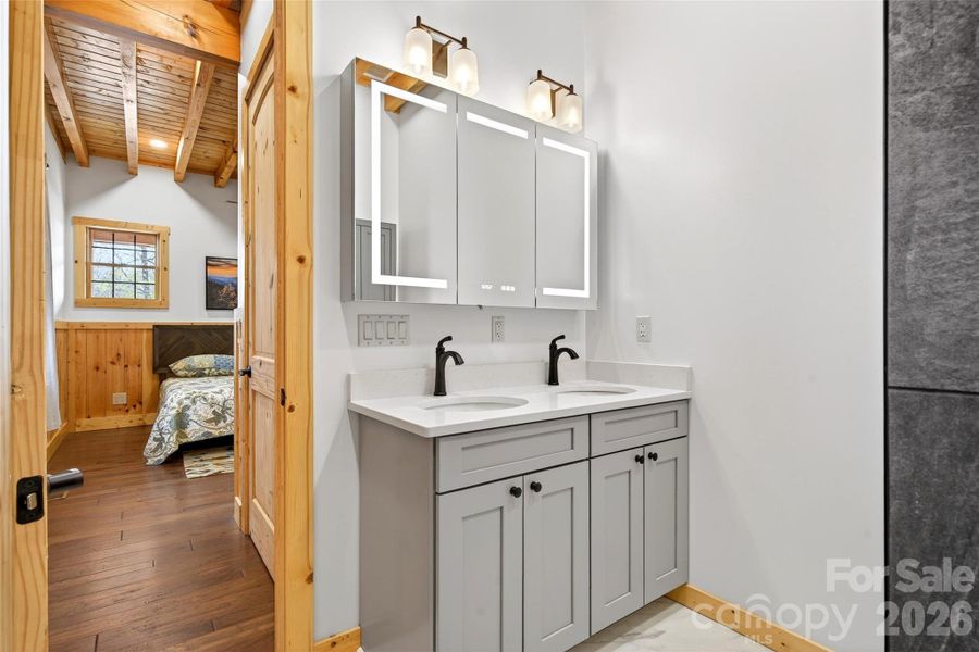 Illuminated smart mirror cabinet.