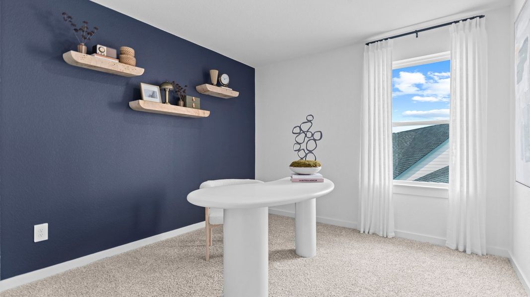 Furnished interior view inside a new home in Caldwell Crossing, Iowa Colony (Image 14).