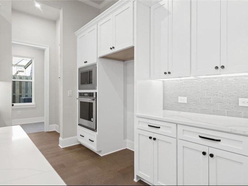 Furnished interior view inside a new home in The Village at Towne Lake, Woodstock (Image 10).