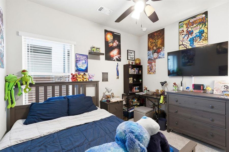 Bedroom 2 with a ceiling fan Bedroom 2 with a ceiling fan