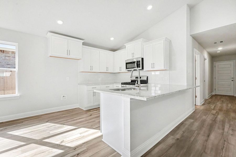 Furnished interior view inside a new home in Bayou Maison, Dickinson (Image 5).