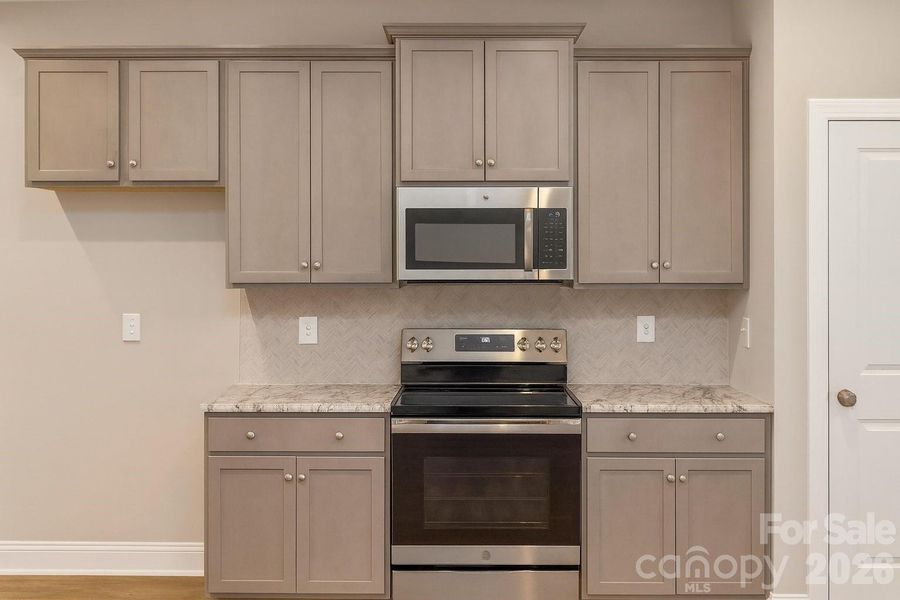 Furnished interior view inside a new home in , Concord (Image 4).