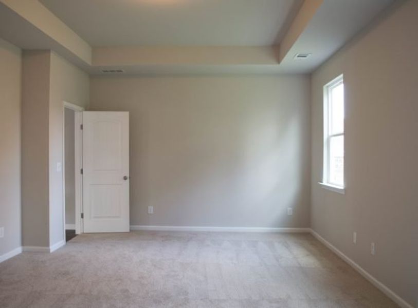Representative unfurnished interior of a home built from the Poplar by Piedmont Residential in Falls Creek, Flowery Branch (Image 17).