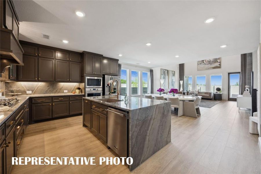 The chef will never be left out of the party in this fantastic open concept home.  REPRESENTATIVE PHOTO