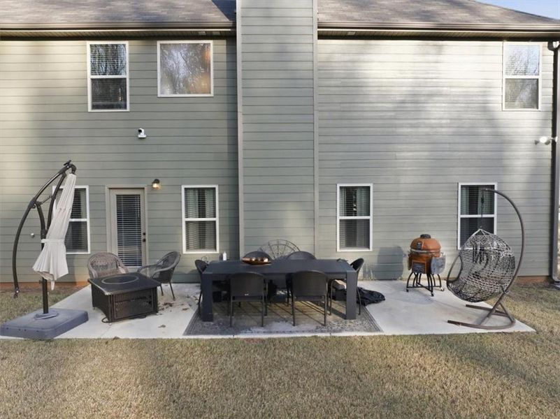 Exterior details and patio area of a home in Nine Oaks, Locust Grove (Image 31).