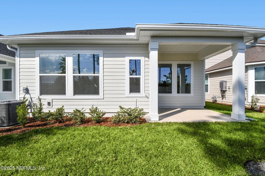 Exterior details and patio area of a home in Crosswinds 40’, Ponte Vedra (Image 3).