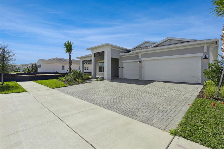 Front exterior of a new home in , Tavares, FL, highlighting curb appeal (Image 28).