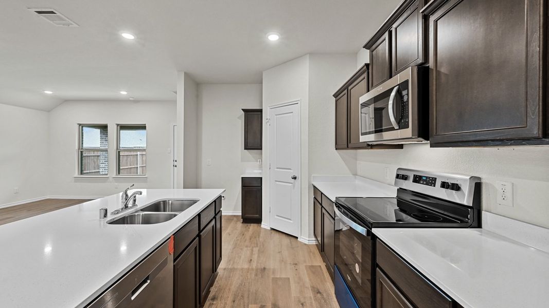 Furnished interior view inside a new home in Stonewyck Farms, Ennis (Image 7).
