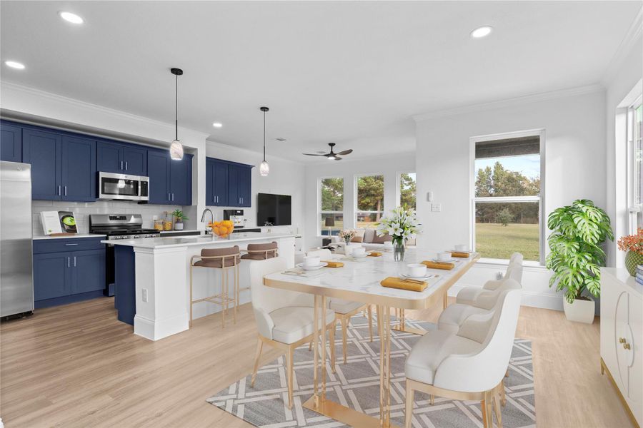 What an amazing home!  Beautiful luxury large plank wood vinyl flooring throughout with custom large baseboards for that custom look!  The casual dining area flows into the gourmet kitchen and wonderful family area.  *Virtual stage*