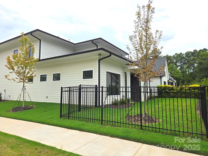 Front exterior of a new home in , Charlotte, NC, highlighting curb appeal (Image 23).
