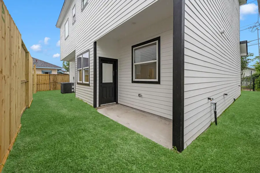 Exterior details and patio area of a home in , Houston (Image 3).