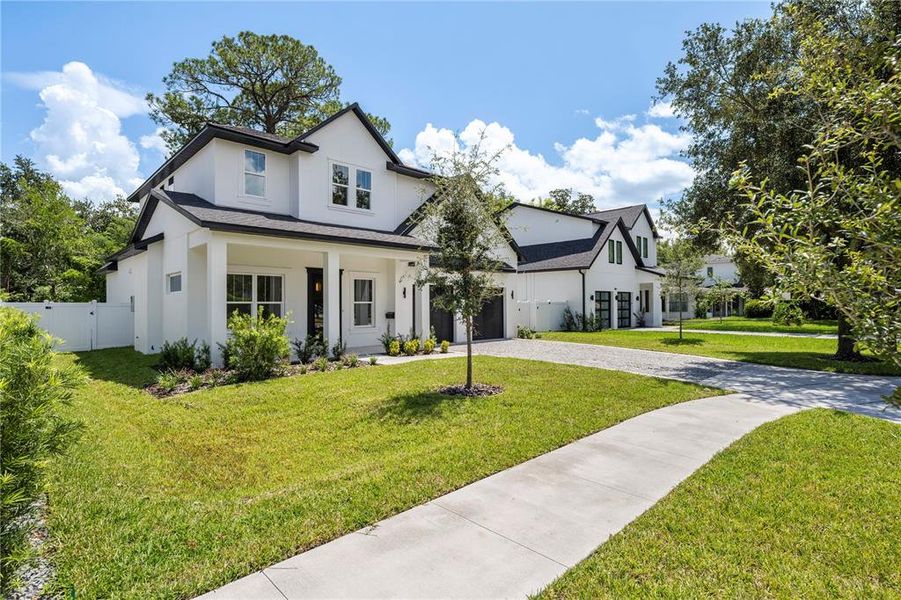 Front exterior of a new home in , Winter Park, FL, highlighting curb appeal (Image 30).