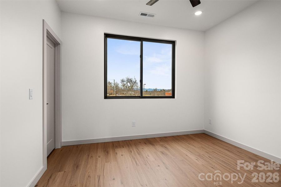 Spacious, unfurnished interior of a new home in , Asheville (Image 40).