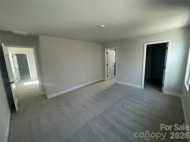 Primary Bedroom on the back of home for maximum privacy and quiet