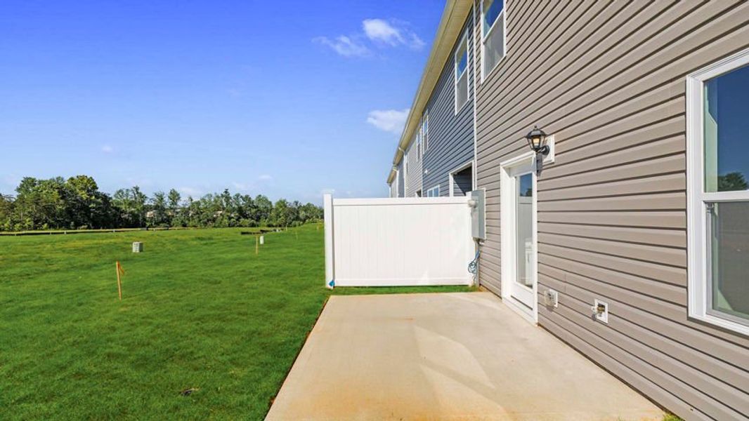 Exterior details and patio area of a home in Covington Village, Greer (Image 19).