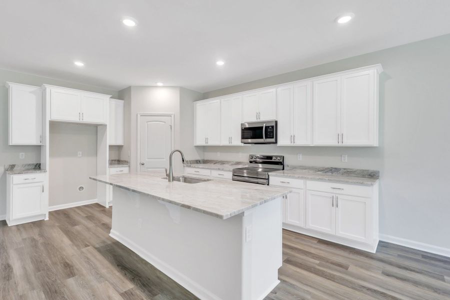 Representative furnished interior of a home built from the The Dublin by Smith Family Homes in Settlers Hammock, Kingsland (Image 14).