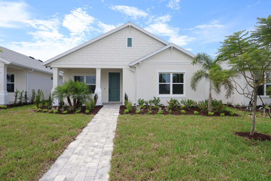 Representative exterior photo of a completed home built from the The Bellmeade by David Weekley Homes in SeaFlower – Bungalow Homes, Bradenton, FL (Image 2). Representative exterior photo of a completed home built from the The Bellmeade by David Weekley Homes in SeaFlower – Bungalow Homes, Bradenton, FL (Image 2).