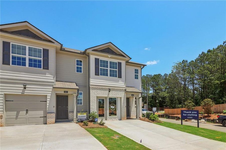 Front exterior of a new home in , Atlanta, GA, highlighting curb appeal (Image 19).