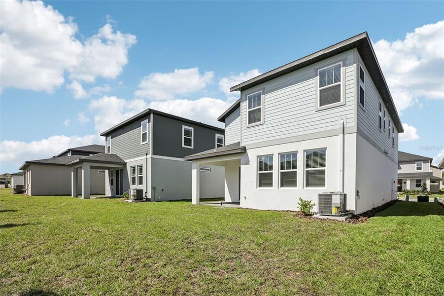 Exterior details and patio area of a home in Cyrene at Minneola, Minneola (Image 3).