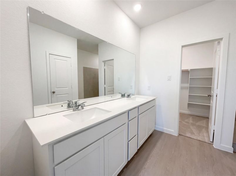 Furnished interior view inside a new home in Sunterra, Katy (Image 8).