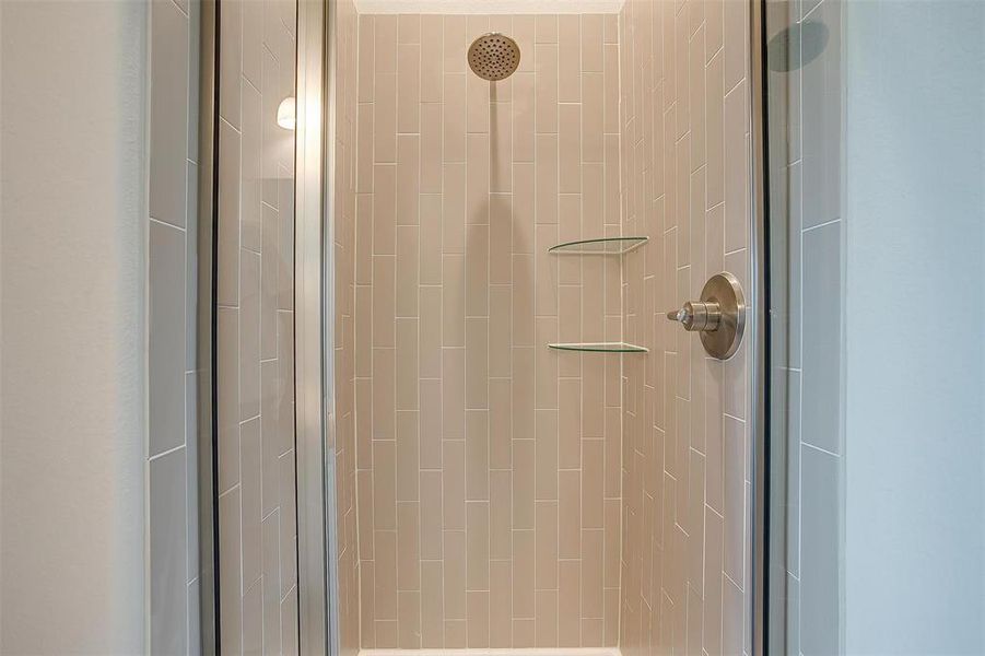 Bathroom featuring walk in shower