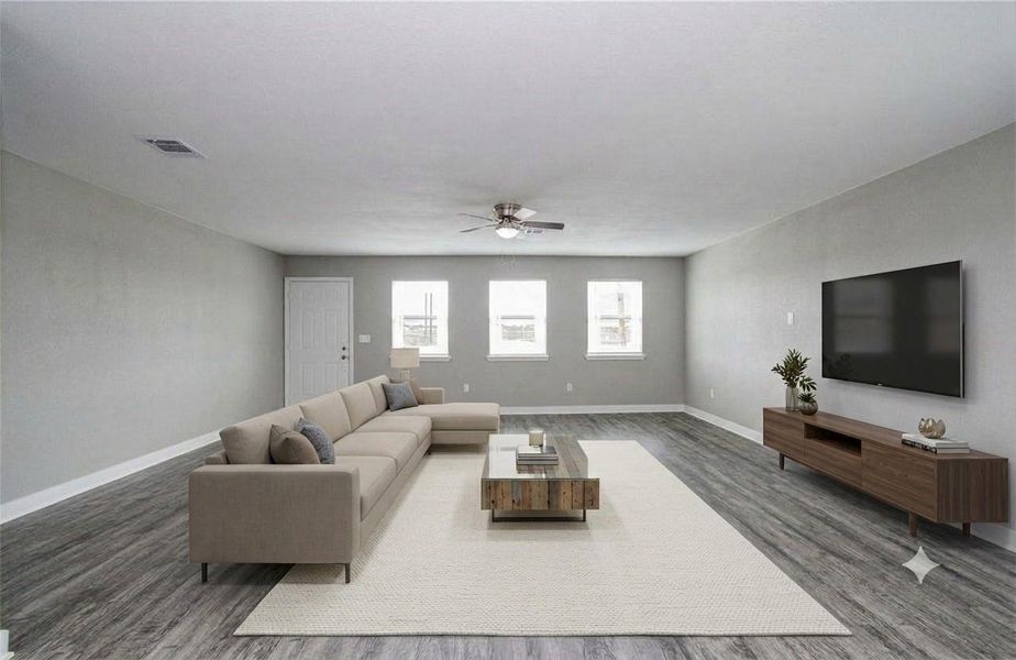 Expansive main living area offering flexibility for entertaining, relaxing, and everyday living. (Virtually Staged)