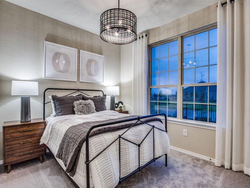 *Model Representation - Spacious secondary bedroom with large windows
