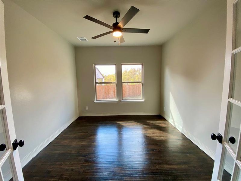 Study offers French doors, hardwoods & fan Study offers French doors, hardwoods & fan