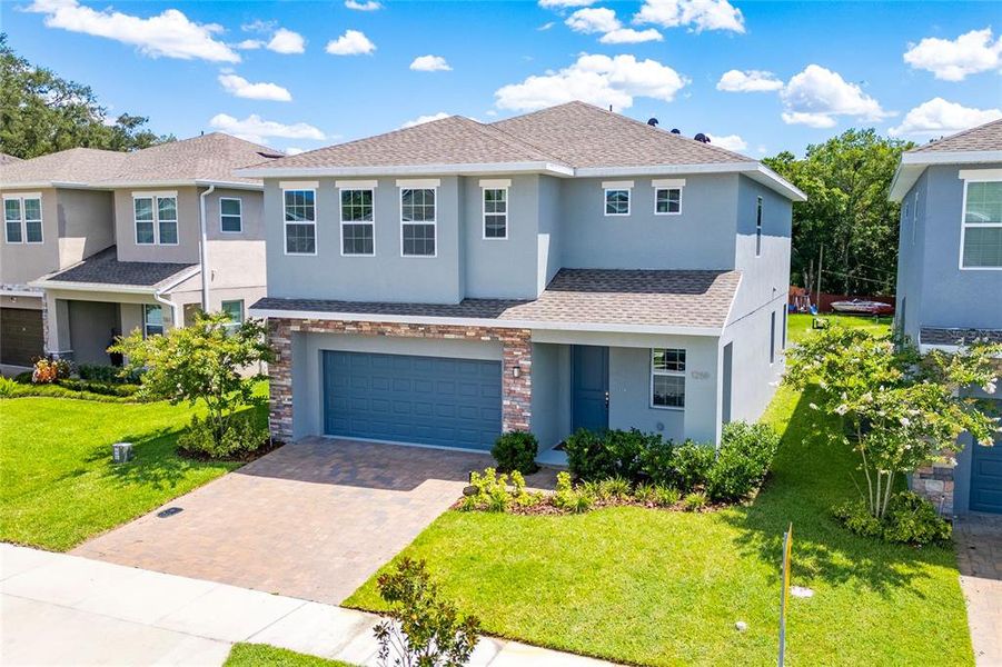 Front exterior of a new home in , Casselberry, FL, highlighting curb appeal (Image 2). Front exterior of a new home in , Casselberry, FL, highlighting curb appeal (Image 2).