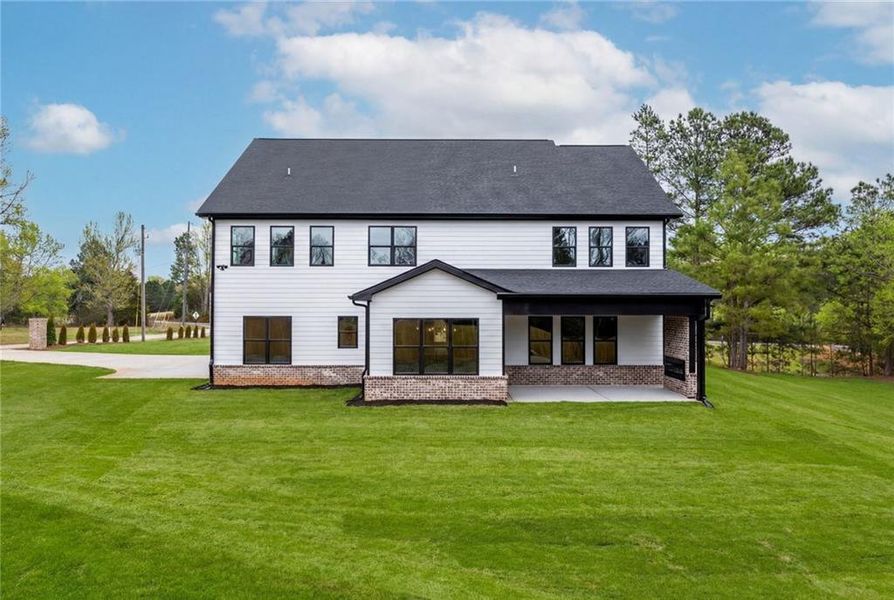 Exterior details and patio area of a home in , Pendergrass (Image 24).