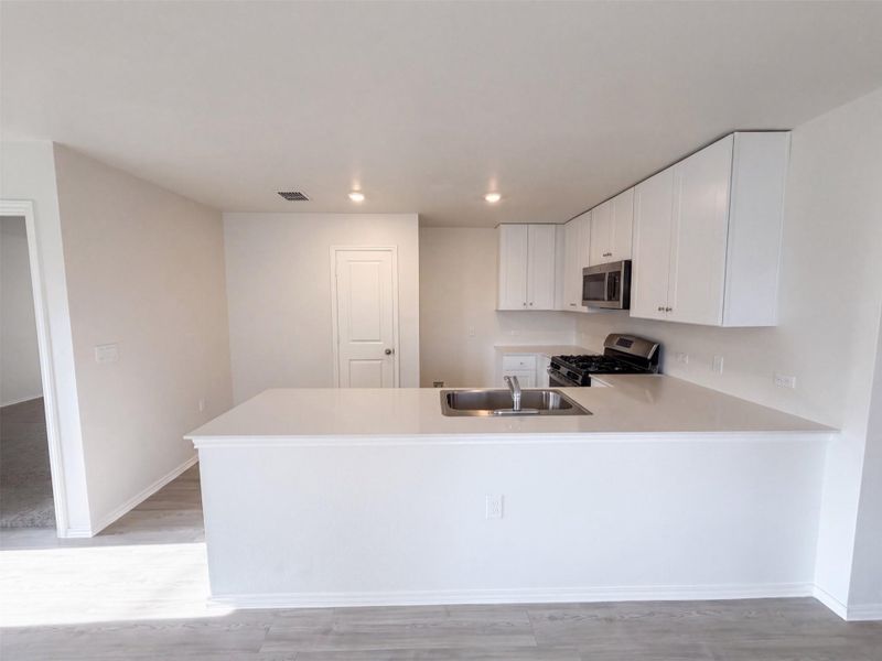 Furnished interior view inside a new home in , Pflugerville (Image 12).