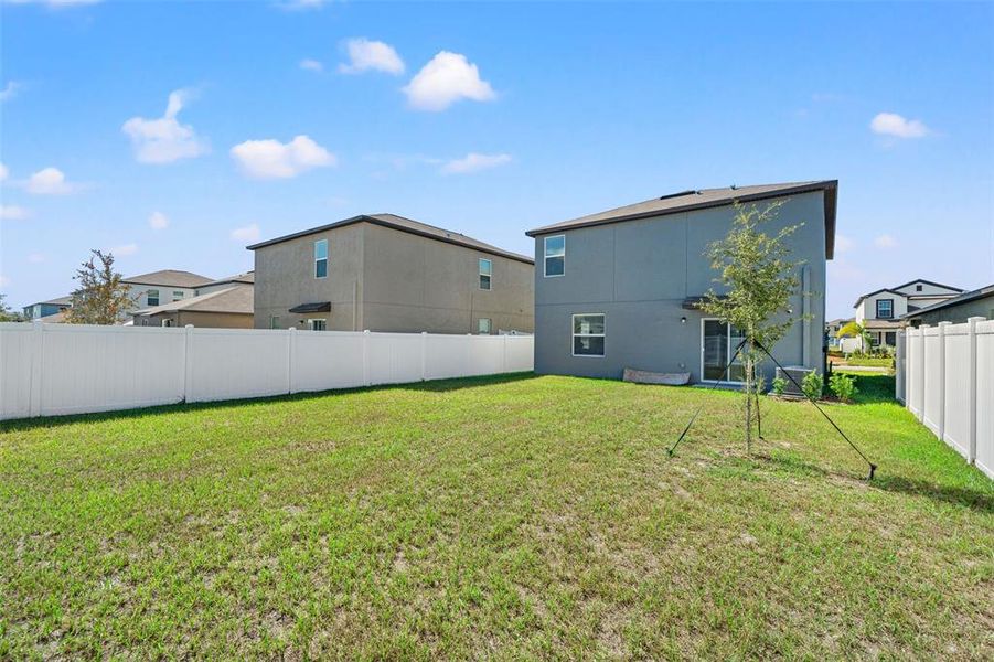Exterior details and patio area of a home in Verano: The Manors, Spring Hill (Image 24).