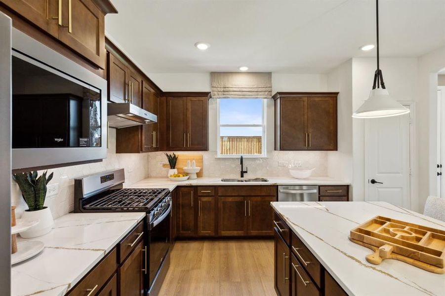 *Model Representation - Abundant cabinet space in kitchen