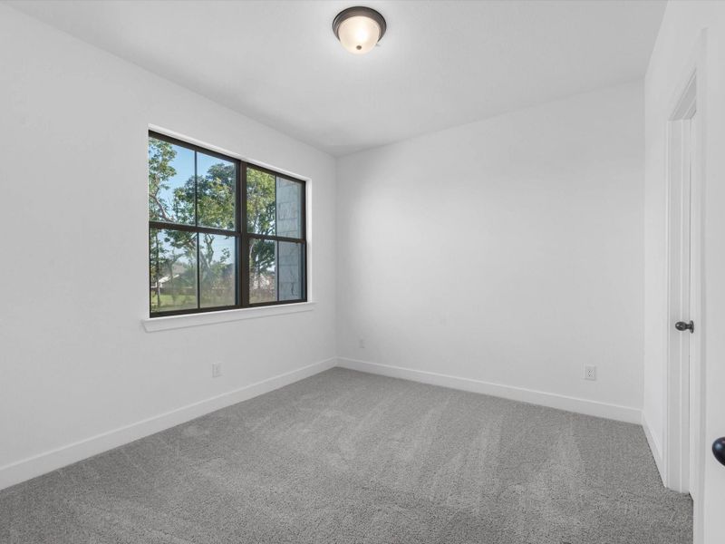 Spacious, unfurnished interior of a new home in Sienna, Missouri City (Image 20).