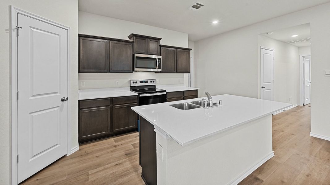 Furnished interior view inside a new home in Stonewyck Farms, Ennis (Image 5).