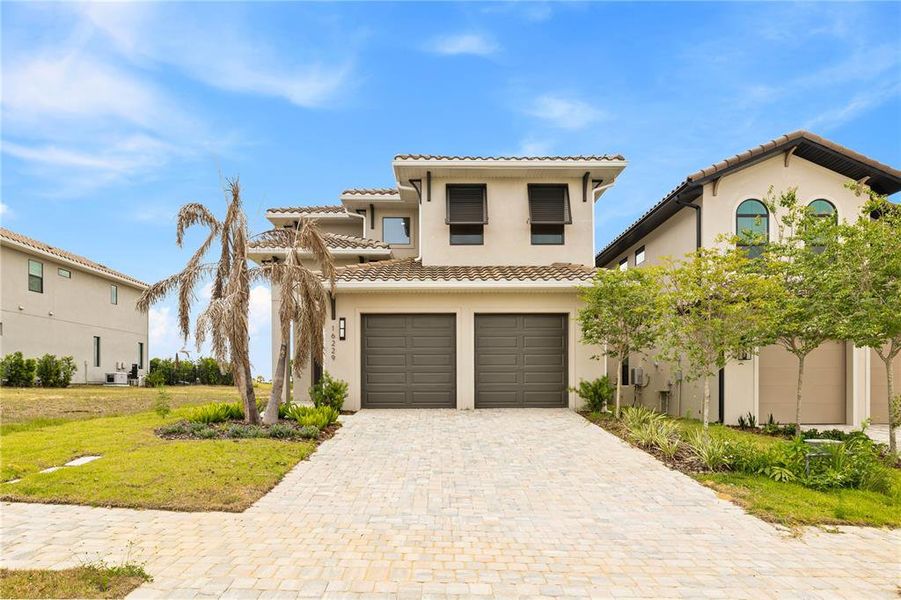 Front exterior of a new home in , Montverde, FL, highlighting curb appeal (Image 31).